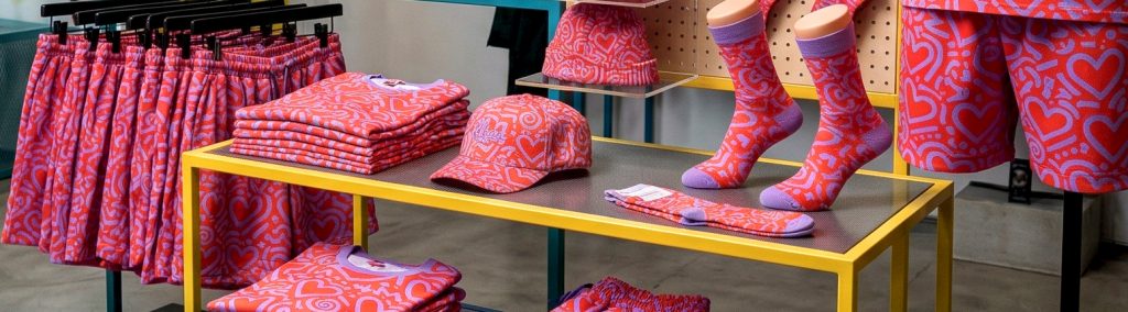 Man In A Geometric Print Bomber Jacket.